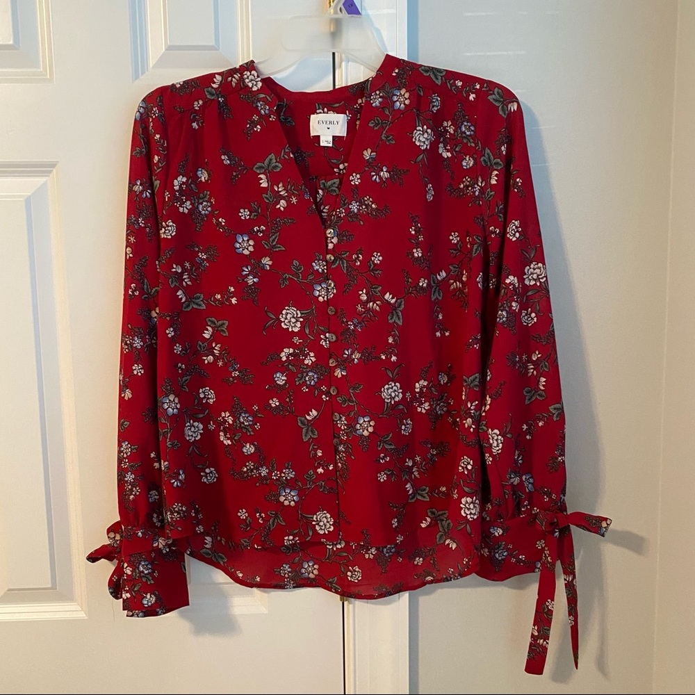 Red floral blouse